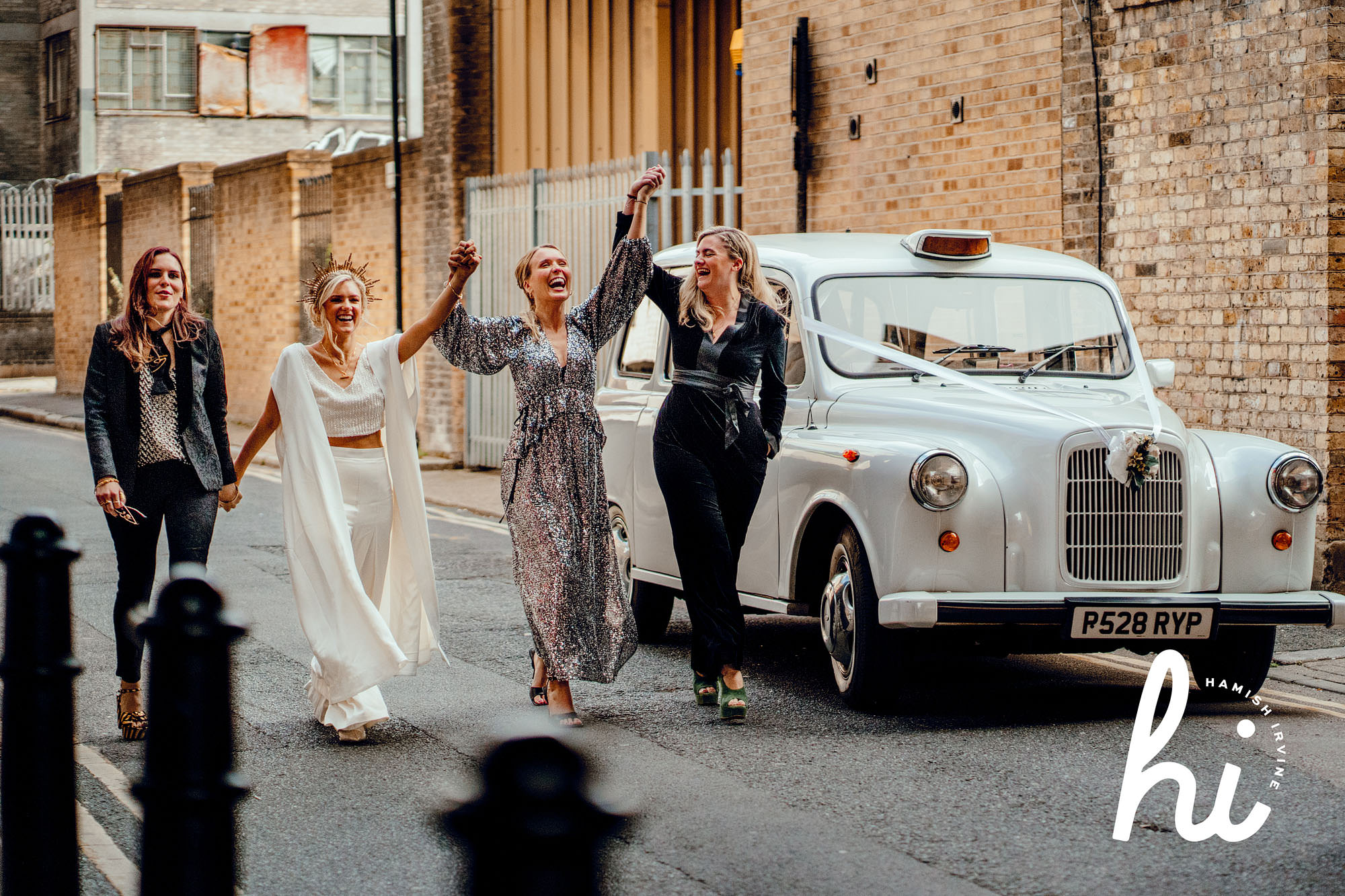 London white cab taxi hire wedding Shoreditch Studios Wedding Photographer Hamish Irvine