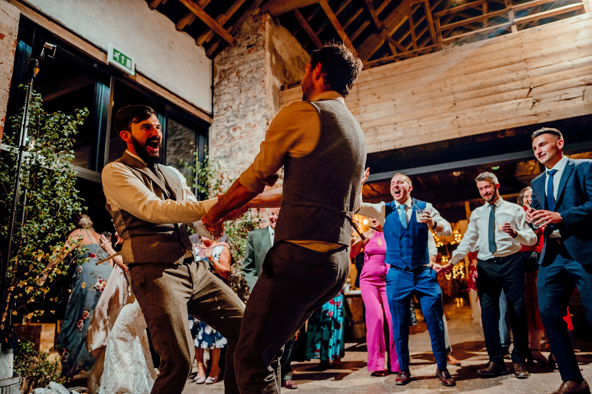emma andy hamish irvine woolas barn colourful wedding photography 