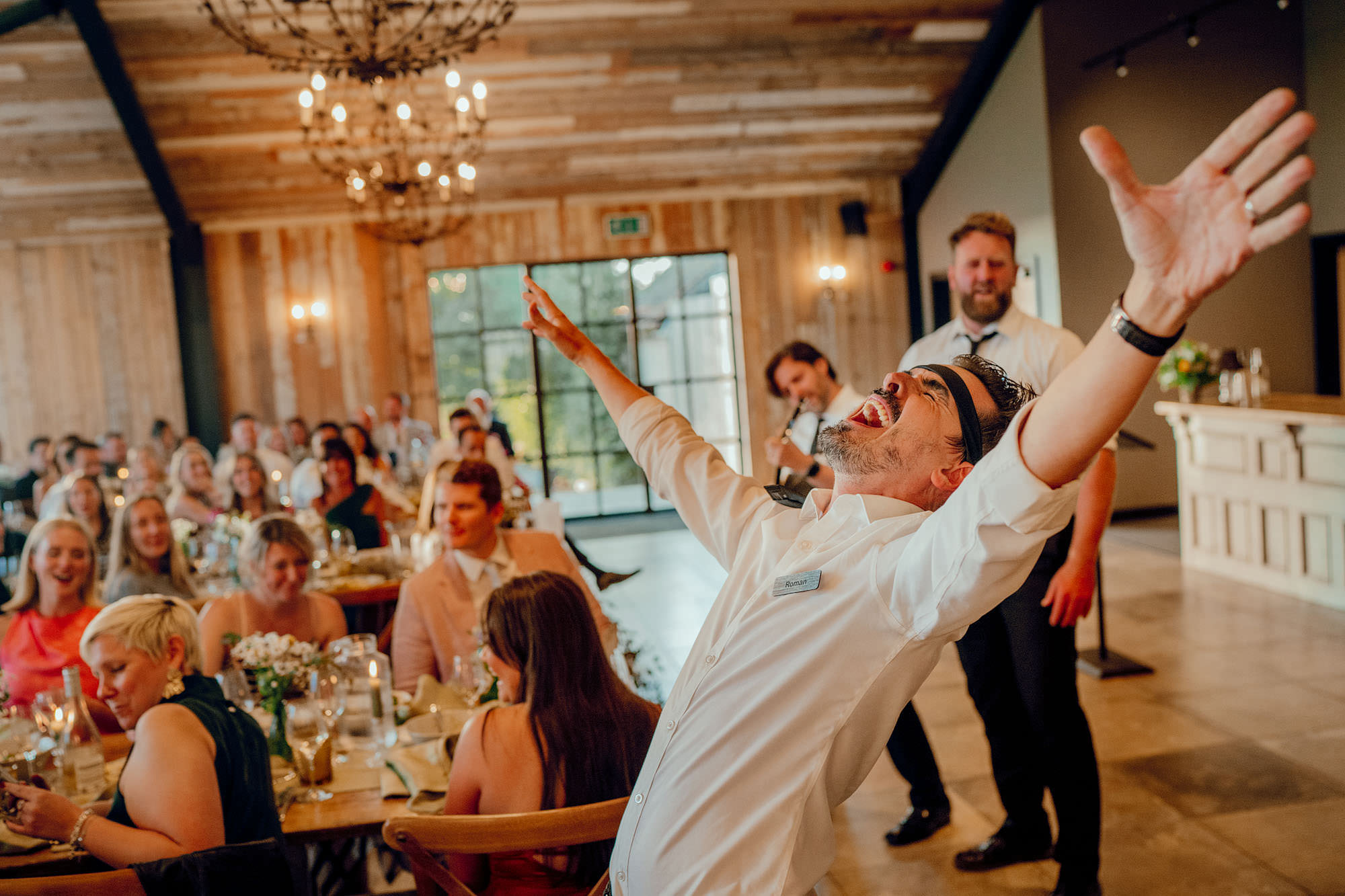 Singing Waiters at the Barn at Botley Hill Colourful Wedding Photography by Hamish Irvine 