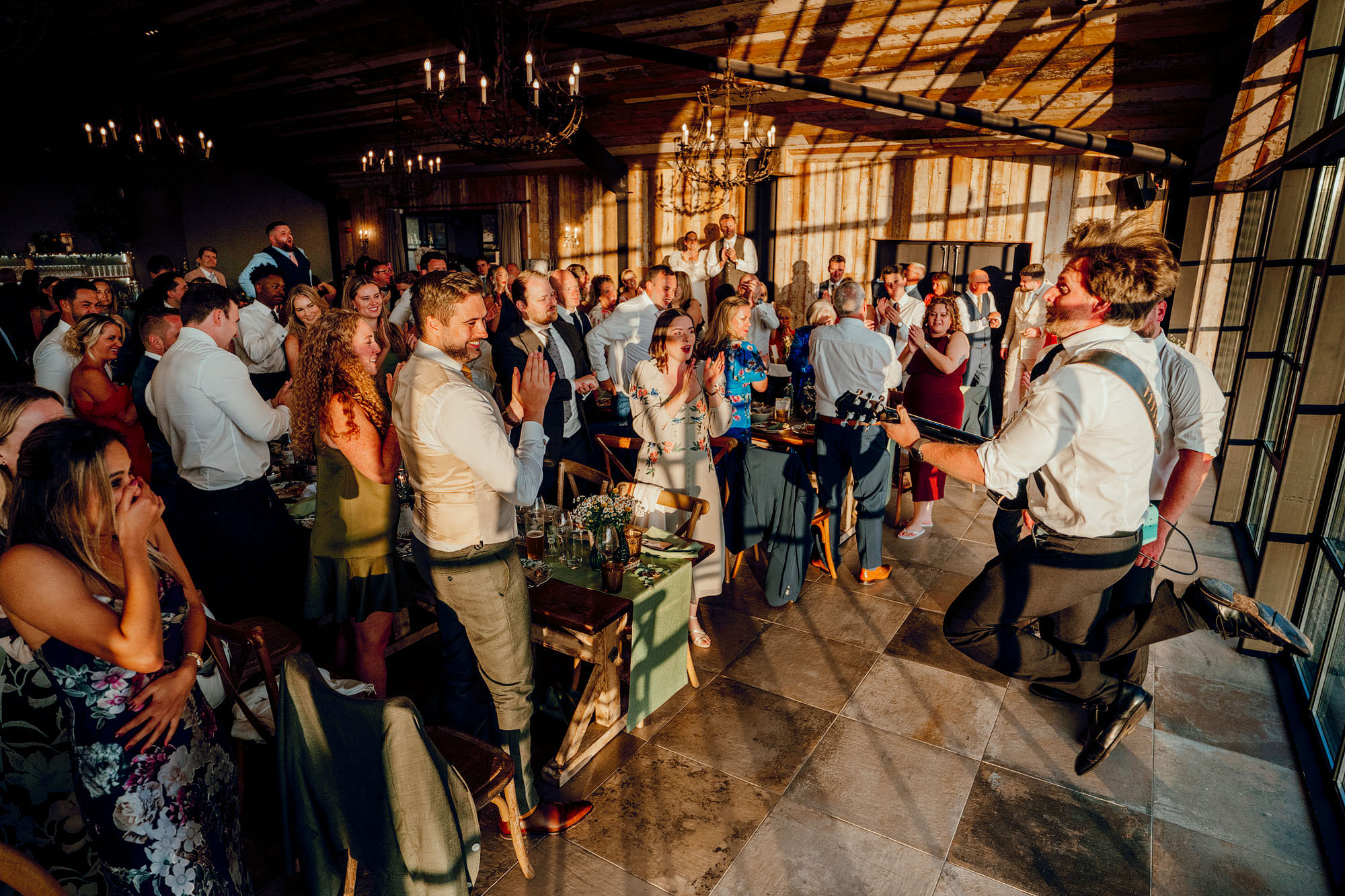 singing waiters Barn at Botley Hill Colourful Wedding Photography by Hamish Irvine 