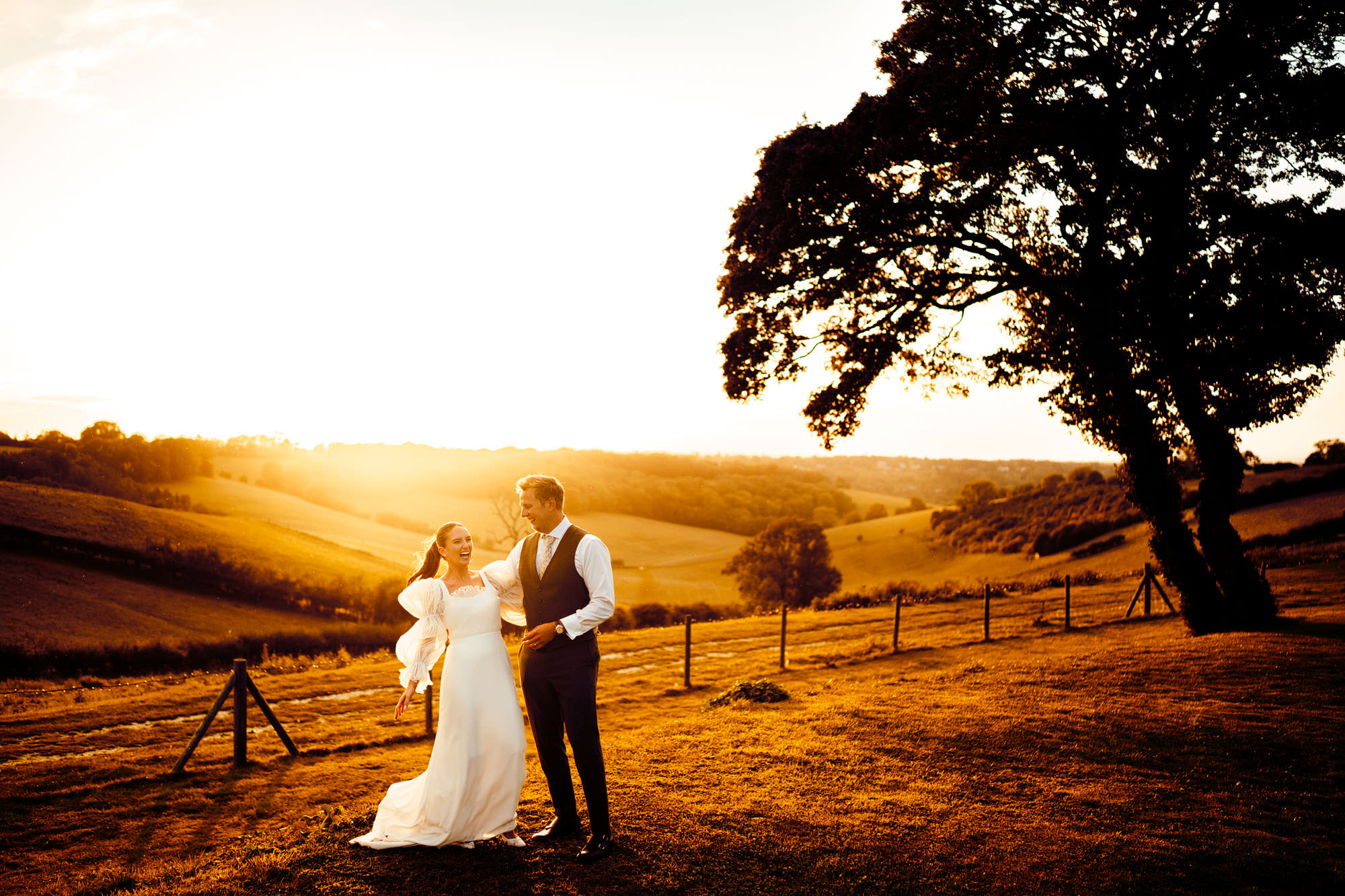 fun wedding photogtaphy surrey hamish irvine barn at botley hill 