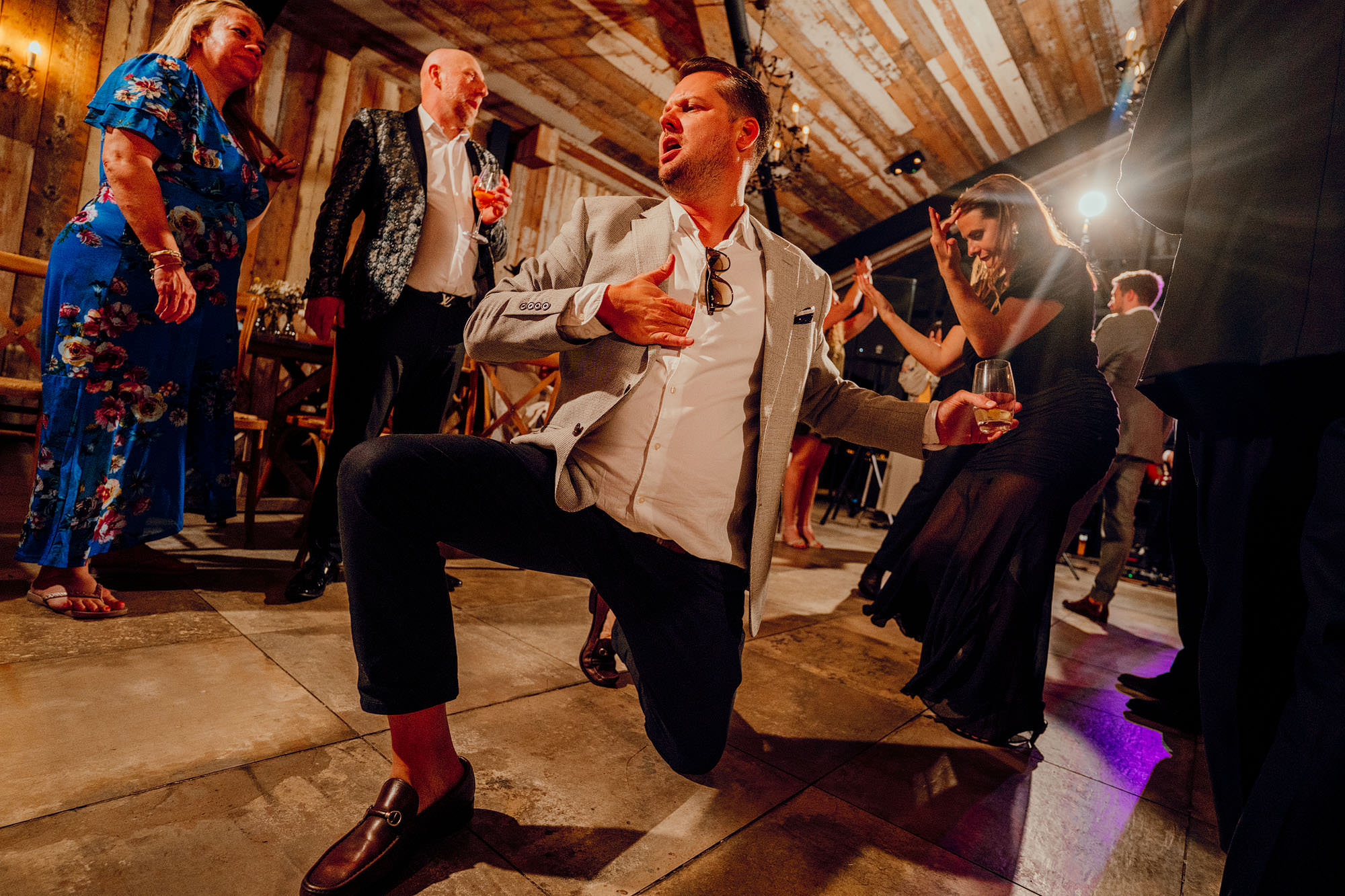 fun wedding photogtaphy surrey hamish irvine barn at botley hill 